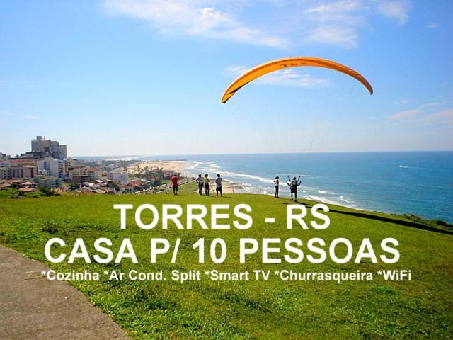 CASA completa em TORRES-RS - O MELHOR CUSTO BENEFICIO na mais bela praia Gaúcha - Cozinha - Banheiro - Ar condicionado - Smart TV 32 Android Apps Youtube - Netflix - Prime Vídeo e Wi-Fi - Estacionamento - Acomoda até 10 pessoas - Anfitriã Superhost n Villa Esterno foto