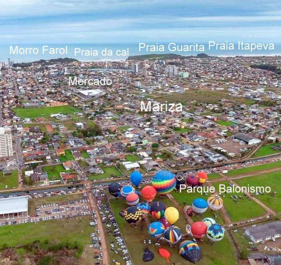 CASA completa em TORRES-RS - O MELHOR CUSTO BENEFICIO na mais bela praia Gaúcha - Cozinha - Banheiro - Ar condicionado - Smart TV 32 Android Apps Youtube - Netflix - Prime Vídeo e Wi-Fi - Estacionamento - Acomoda até 10 pessoas - Anfitriã Superhost n Villa Esterno foto