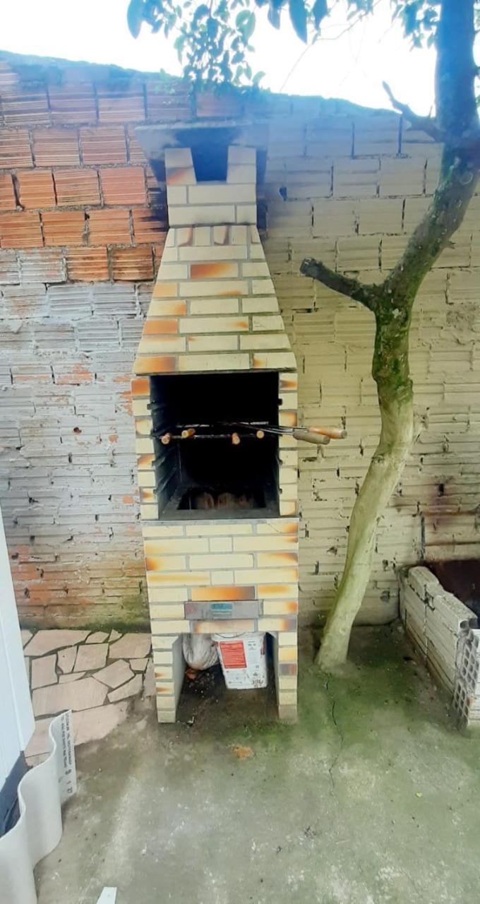 CASA completa em TORRES-RS - O MELHOR CUSTO BENEFICIO na mais bela praia Gaúcha - Cozinha - Banheiro - Ar condicionado - Smart TV 32 Android Apps Youtube - Netflix - Prime Vídeo e Wi-Fi - Estacionamento - Acomoda até 10 pessoas - Anfitriã Superhost n Villa Esterno foto
